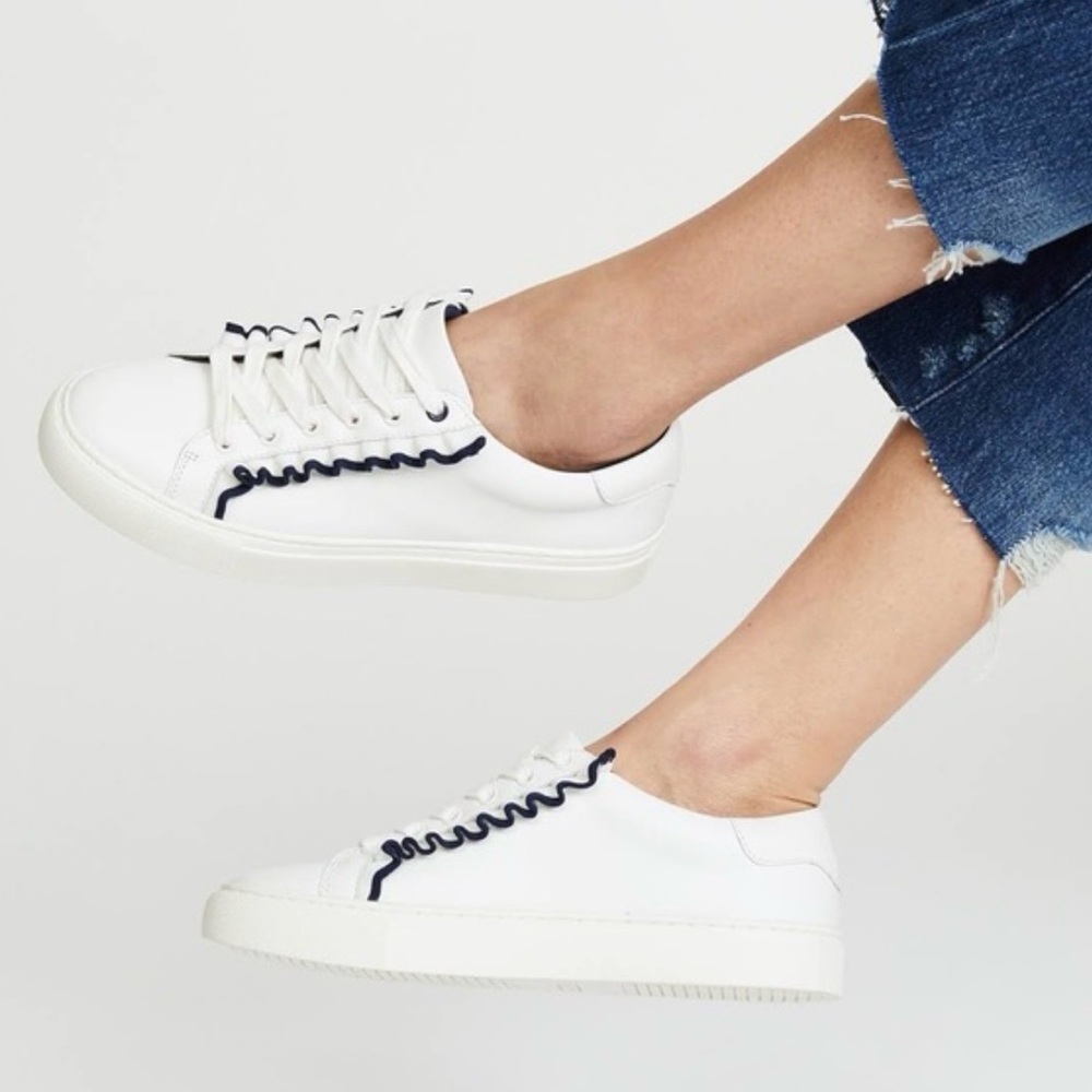 Tory Burch Ruffle sneakers.‎ Size 10M. White with elegant black ruffle.